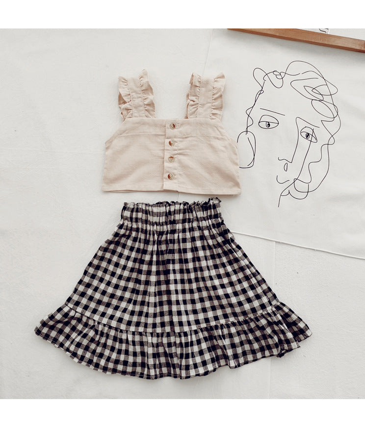 Short Top With Suspenders And Plaid Skirt